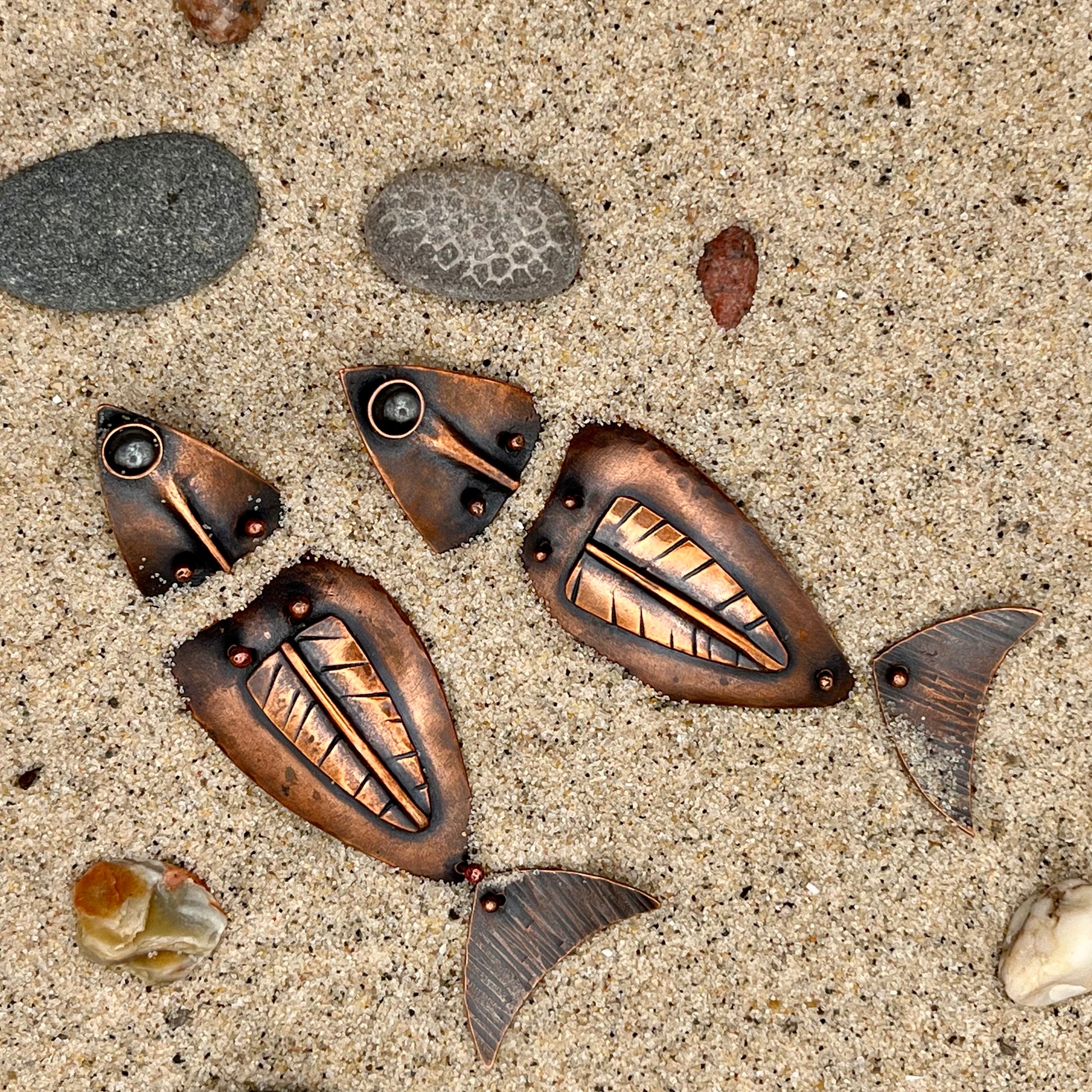 long modern hand forged metalsmith copper fish earrings